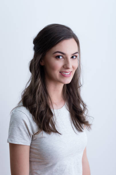 istock Girl in white t-shirt smiling 641803518