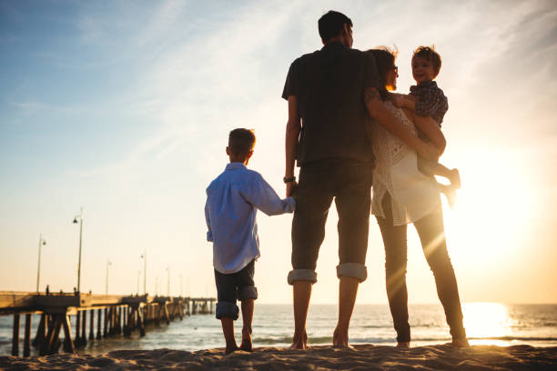 istock Millennial Family At the Beach 641805652
