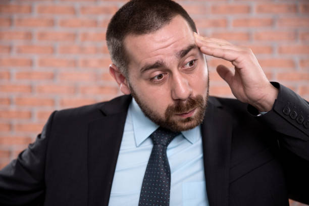istock Businessman having a headache 641809864
