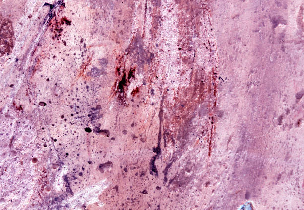 istock Weathered grungy purple cement wall texture 641817776
