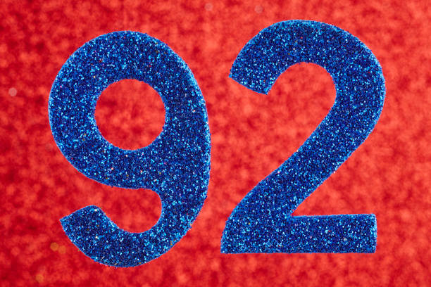 Number ninety-two blue color over a red background. Anniversary.