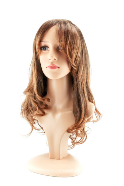 woman mannequin head fake with brown wig on white background