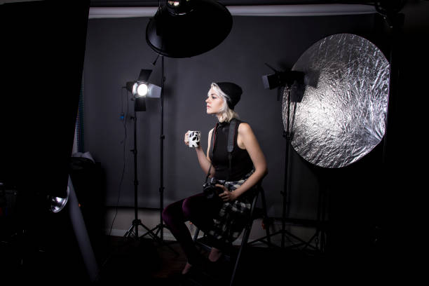 istock Female Hipster Photographer Drinking Coffee 641830672