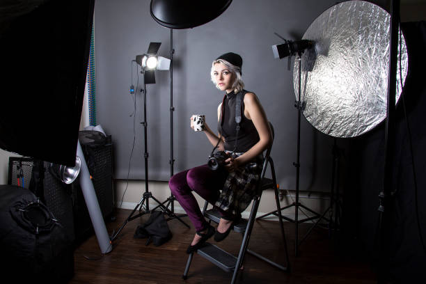 istock Female Hipster Photographer Drinking Coffee 641830678