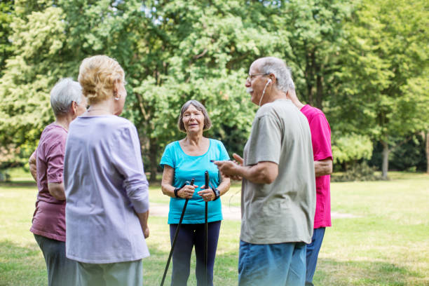 istock Healthy senior people taking break from walking 641834350