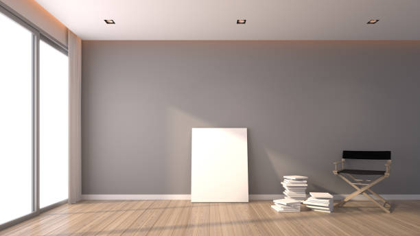 istock rendering of simple black chair and blank picture frame on the timber floor 641839402
