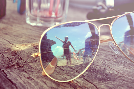 Sunglasses,girl and beach