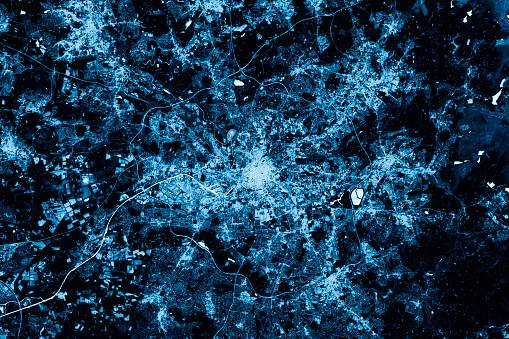 Blue toned Satellite Image of Manchester, UK. Digital Composite. Contains modified Copernicus Sentinel data (2016) courtesy of ESA. URL of source image: https://scihub.copernicus.eu/dhus/#/home. The source data is in the public domain.