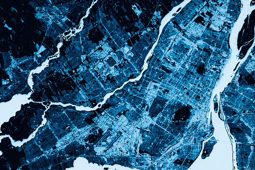 Blue toned Satellite Image of Montreal, Canada. Digital Composite. Contains modified Copernicus Sentinel data (2016) courtesy of ESA. URL of source image: https://scihub.copernicus.eu/dhus/#/home. The source data is in the public domain.