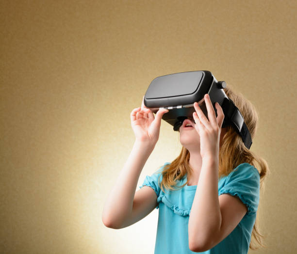 istock Little girl in virtual goggles 641843840
