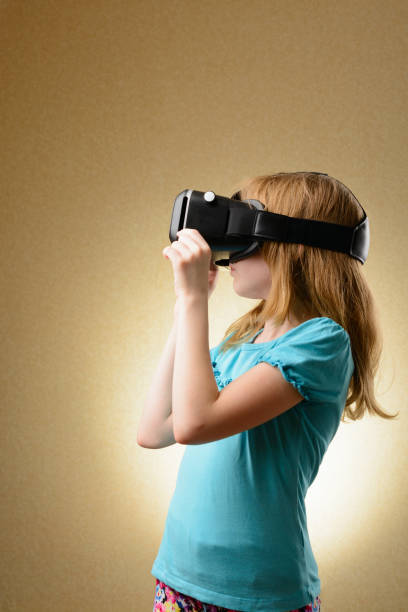 istock Little girl in virtual goggles 641843846
