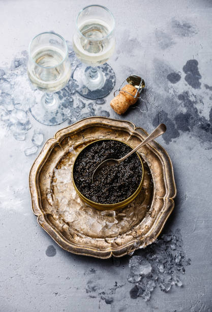 istock Black sterlet caviar and champagne 641845774