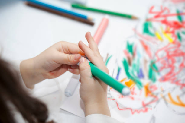 istock Children in pre-school workhsop - close up 641845810