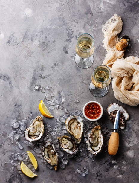 Open Oysters with sauce and champagne