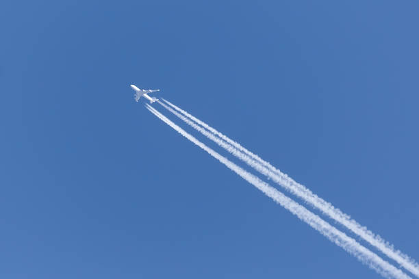 jet with four engines in the clear sky