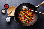 Udon stir-fry noodles with chicken and vegetables