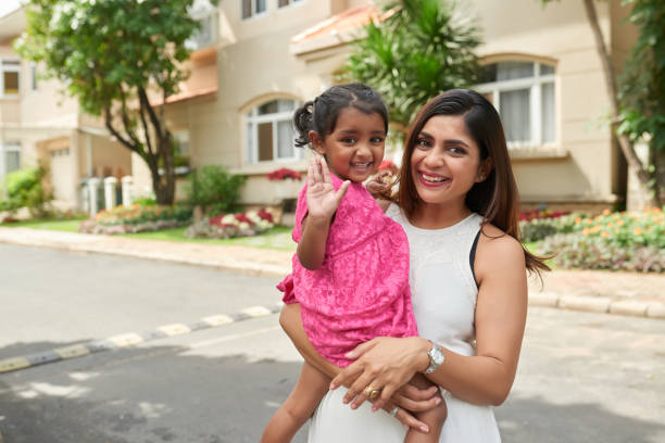 istock Taking photo in front of house 641851236