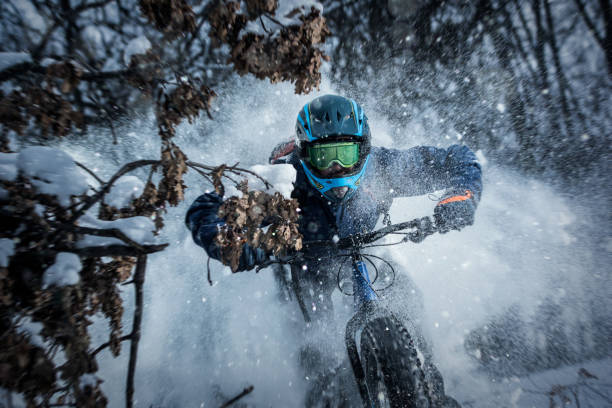 istock Man rides fat bike in the forest 641855632