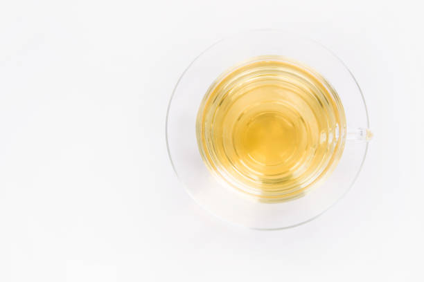 istock Glass cup with green tea on white background. 641858572