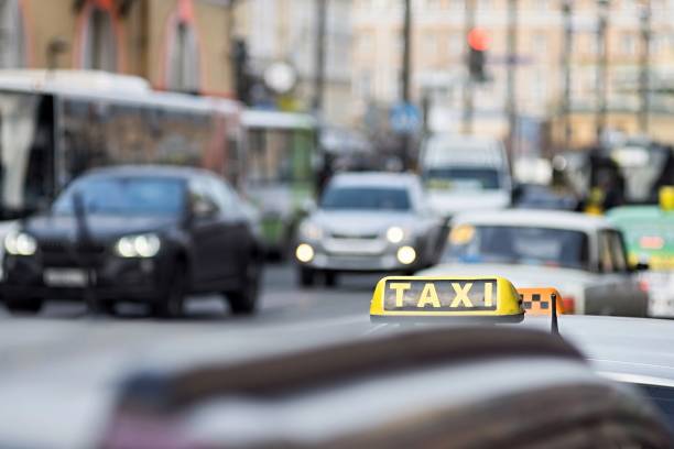 istock taxi on city streets 641859870