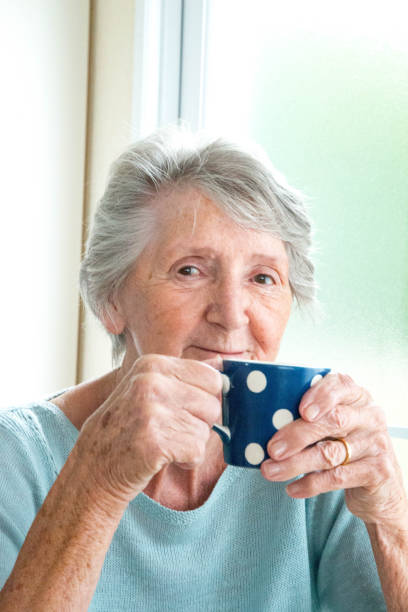 istock Senior woman drinking coffee 641860624