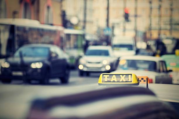 istock taxi on city streets with a digital retro effect 641861300