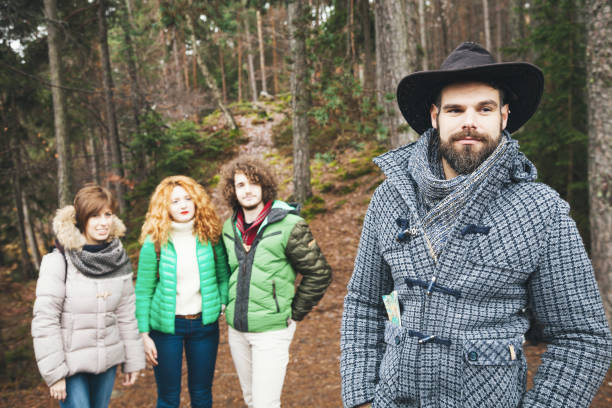 istock Group of friend walking into wood 641862462