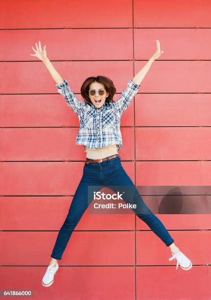 Jumping Happy Girl Stock Photo - Download Image Now - Women, One Woman Only, Bizarre