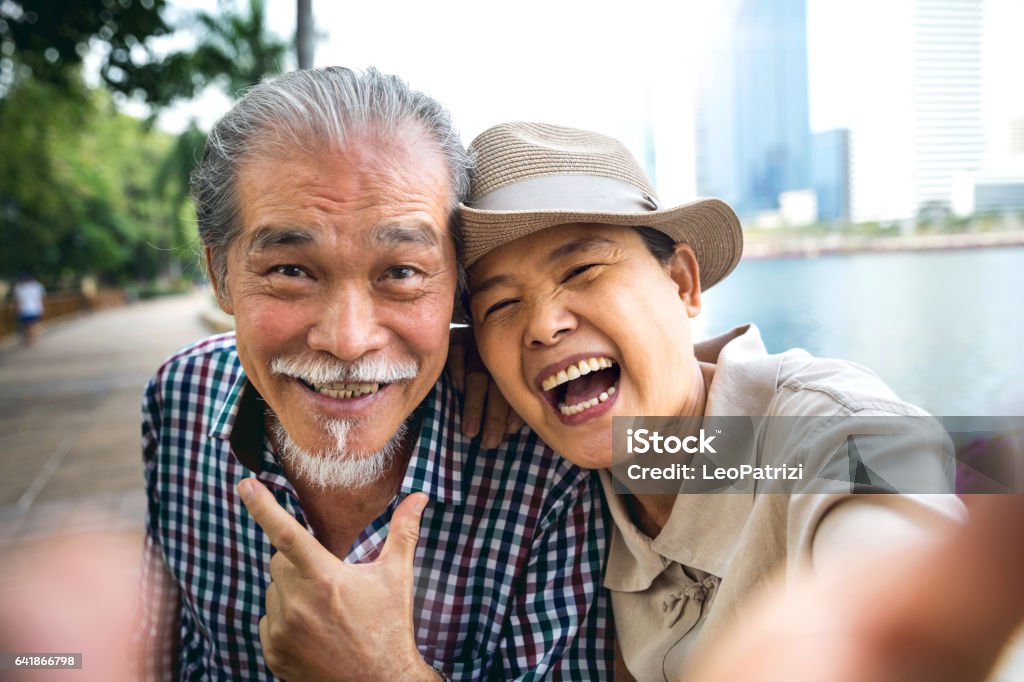 Senior couple candid moments together having a vacation Senior Thai couple candid moments together having a vacation in Bangkok - Thailand. Asia Stock Photo