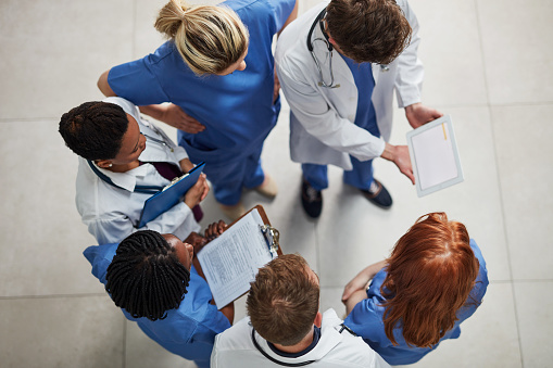 High angle shot of a group of medical practitioners working together in a hospital