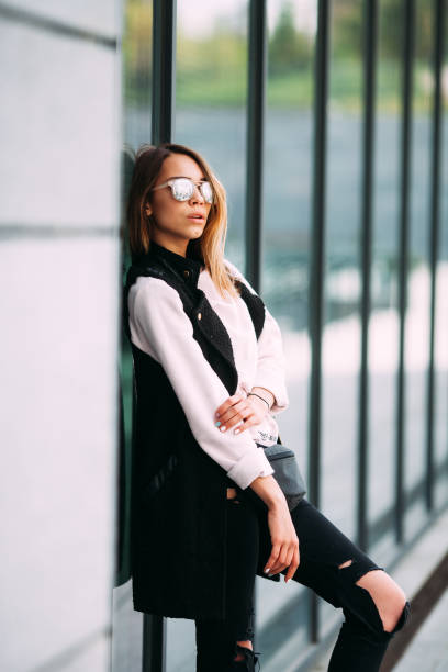 istock pretty young slim woman in rock black style 641867334