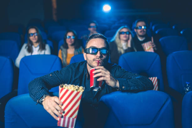 istock Man at movies 641867352
