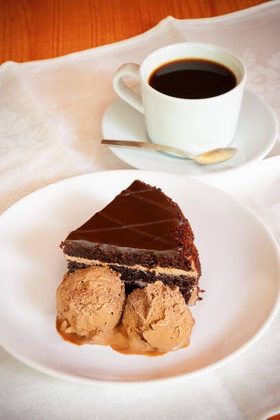 istock Chocolate cake and cup of coffee. Selective focus on cake 641871096
