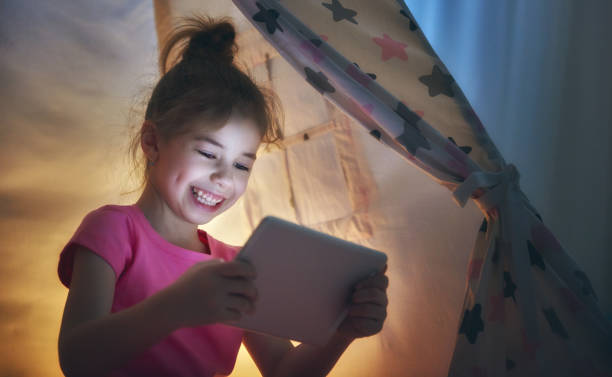 istock girl plays at home 641872174