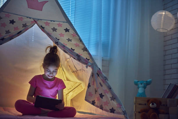 istock girl plays at home 641872298