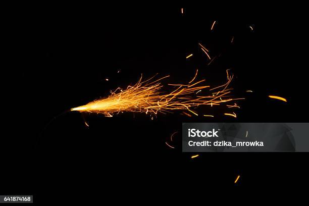Burning Fuse On Black Background Stock Photo - Download Image Now - Sparks, Explosive Fuse, Welding