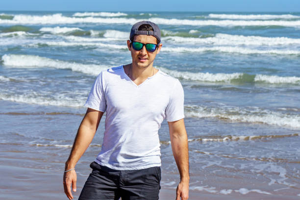 istock Brazilian man running at the seashore 641875774