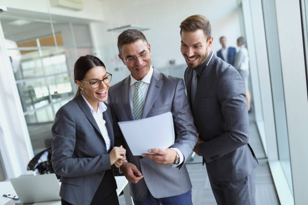 istock Mixed age business people working on some innovative ideas 641876872