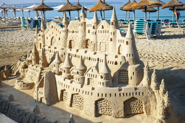 Large sand castle on the beach of Palma de Mallorca in Spain.