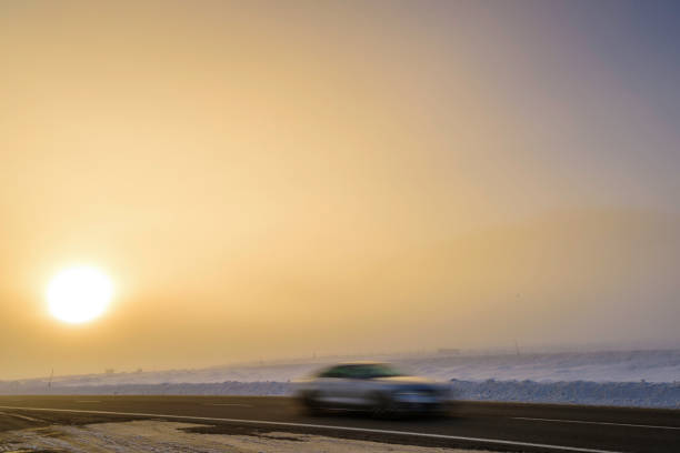 Bishop, Mono County, California, USA - January 15,2017 : Blurred image of early morning travellers to Mammoth Ski Area after heavy snow in the area.