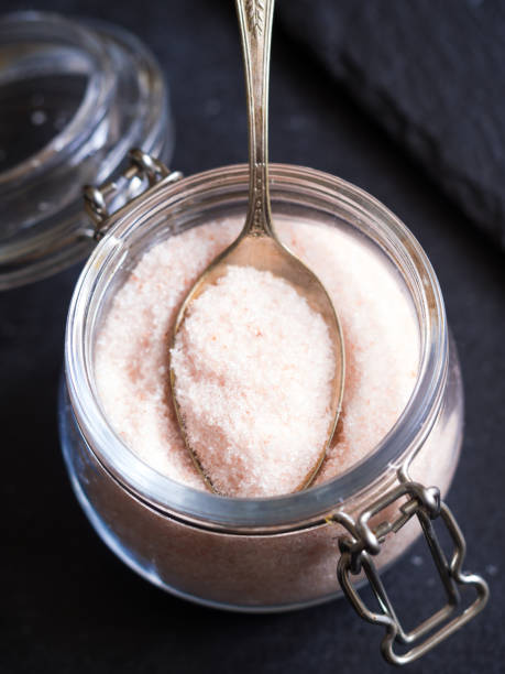 istock Pink himalayan salt in a jar. 641881066
