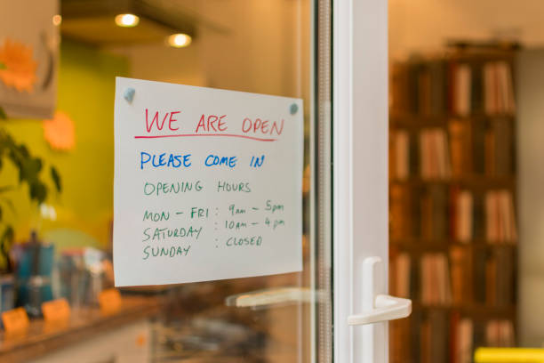 istock Opening Hours of a shop sign 641883524