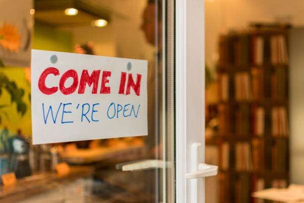 istock Man inside a shop, focus on sign 641883750