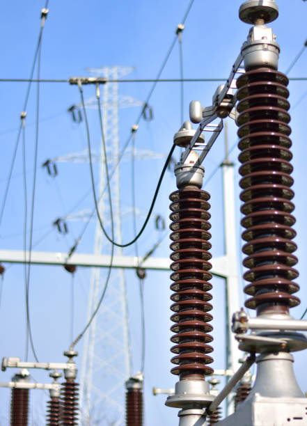 istock Power substation with insulators, power lines and blue sky 641890592