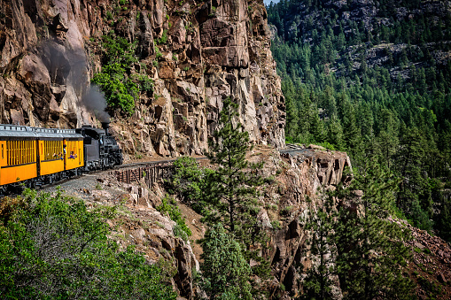 The Durango Silverton Narrow Gauge Railroad takes passengers along sheer cliffs and around mountain bends.