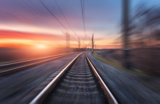istock Railroad in motion at sunset. Railway station 641910206