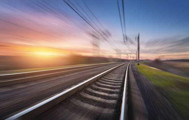 istock Railroad in motion at sunset. Railway station 641910358
