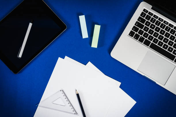 istock view of the blue desk with a computer 641910360