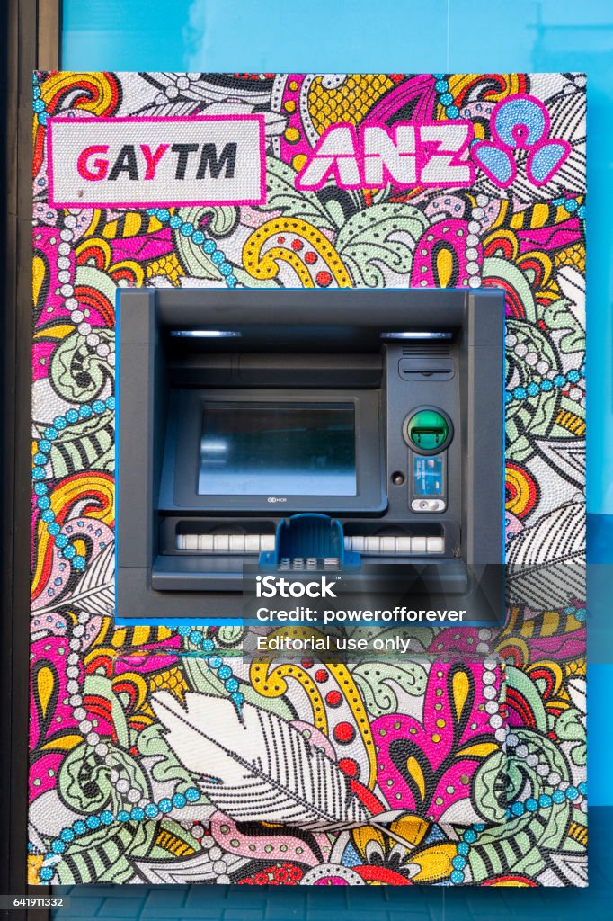 GAYTM in Wellington, New Zealand Wellington, New Zealand - March 4, 2016. GAYTM or Gay ATM on the streets of downtown Wellington the capital city of New Zealand. The ATM is from the Australia and New Zealand Banking Group Limited or ANZ and is decorated with rhinestones over the entire machine. It is part of a campaign they did in sync with the Sydney Gay and Lesbian Mardi Gras in 2015. ATM Stock Photo