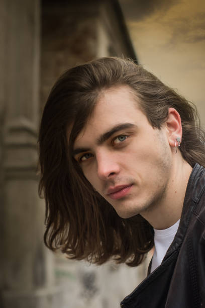 istock Attractive Young Man With Long Hair 641911704